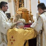 călugăr iezuit, hirotonit diacon la catedrala arhiepiscopală majoră „sfânta treime”